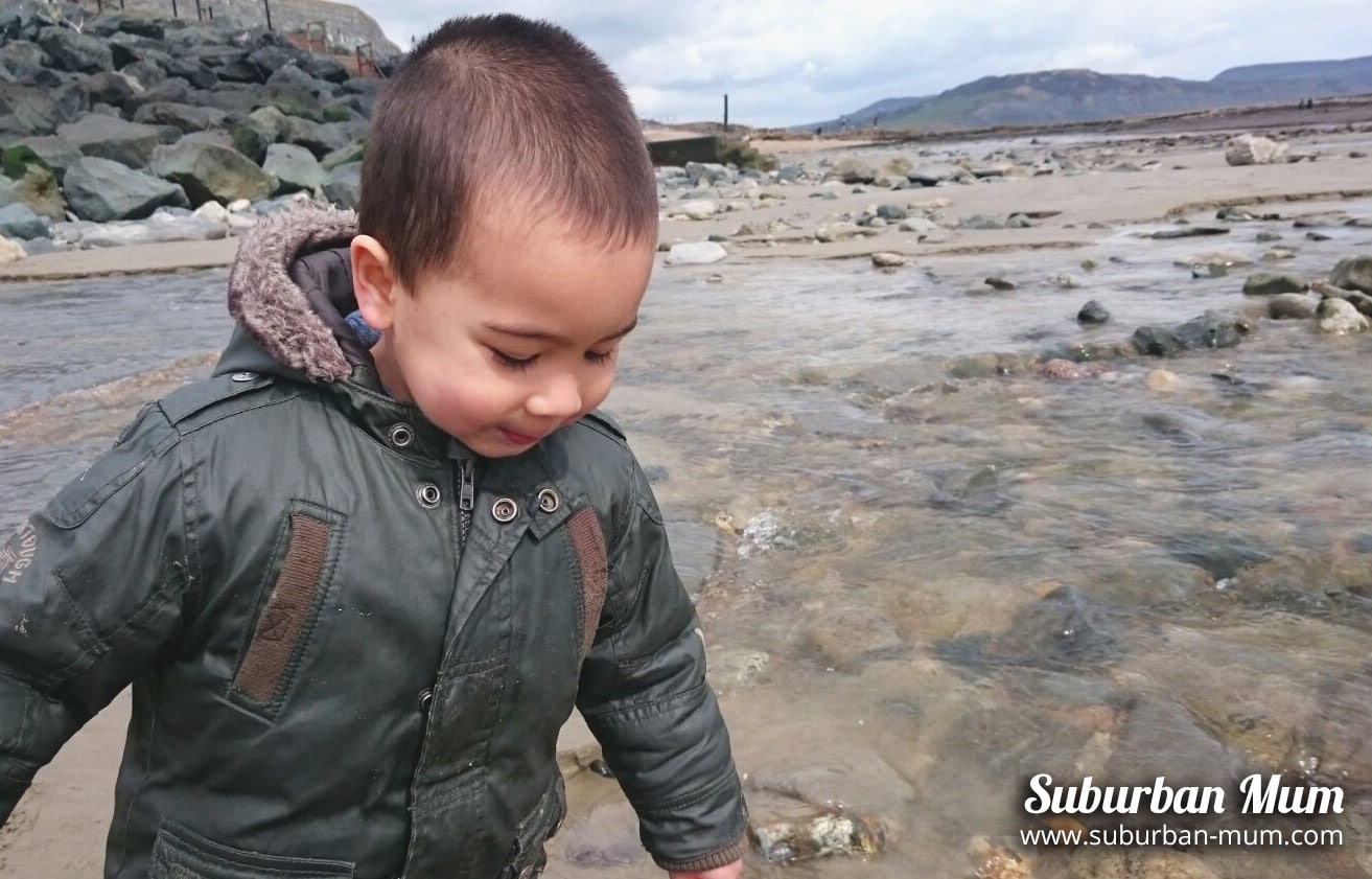 M on the beach