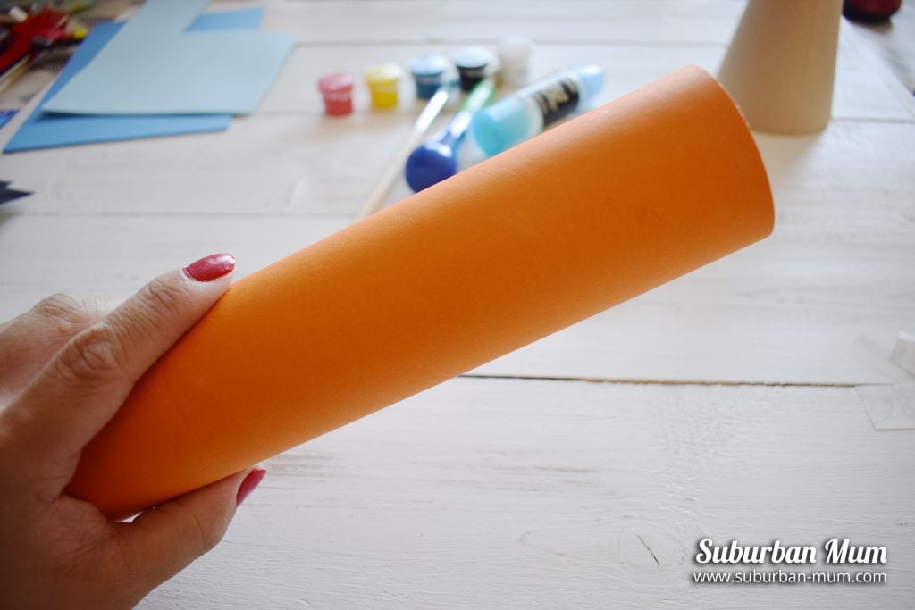 Gluing card onto the kitchen roll tube