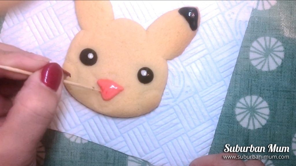 using cocktail stick to shape pikachu's mouth